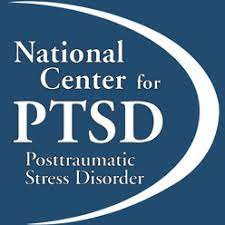 Logo for the National Center For PTSD with the organization name in white text on midnight blue square and including the full text Posttraumatic Stress Disorder. A white arc begins in the middle of the top the square bending almost to the right edge and then back towards the right edge under the text as it bends along the bottom of the square. 